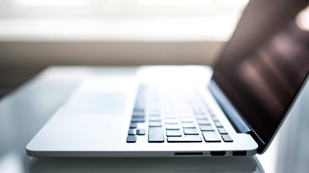 Open laptop representing Ignite health, fitness, nutrition, and wellness blog articles.